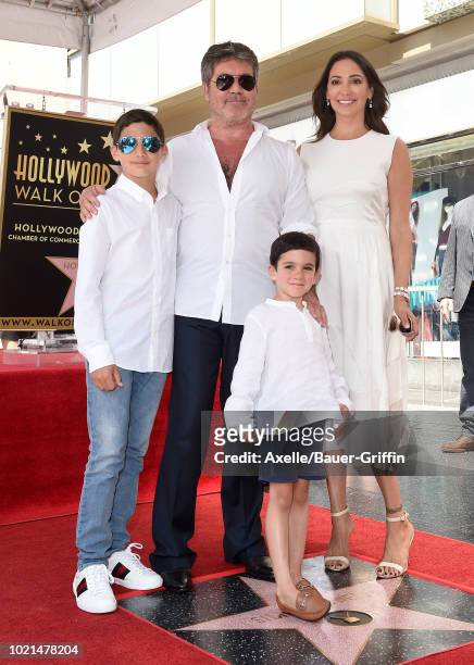 Simon Cowell, Lauren Silverman, Eric Cowell and Adam Silverman attend the ceremony honoring Simon Cowell with star on the Hollywood Walk of Fame on...