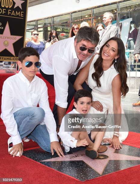 Simon Cowell, Lauren Silverman, Eric Cowell and Adam Silverman attend the ceremony honoring Simon Cowell with star on the Hollywood Walk of Fame on...