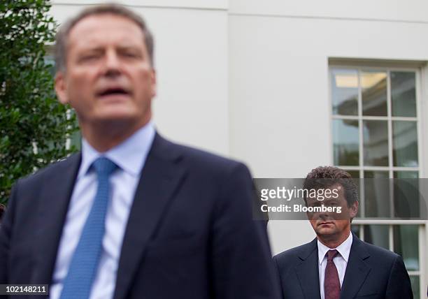 Tony Hayward, chief executive officer of BP Plc, right, listens to BP Chairman Carl-Henric Svanberg speak at the White House in Washington, D.C.,...