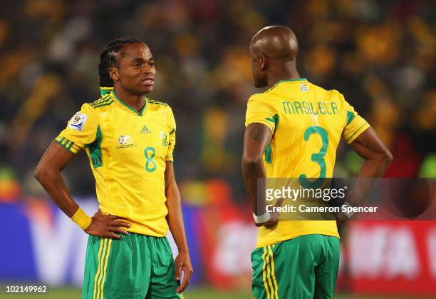 Siphiwe Tshabalala and Tsepo Masilela of South Africa are dejected after defeat in the 2010 FIFA World Cup South Africa Group A match between South...