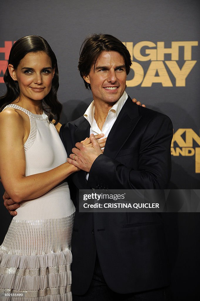 US actors Tom Cruise (R) and his wife Ka