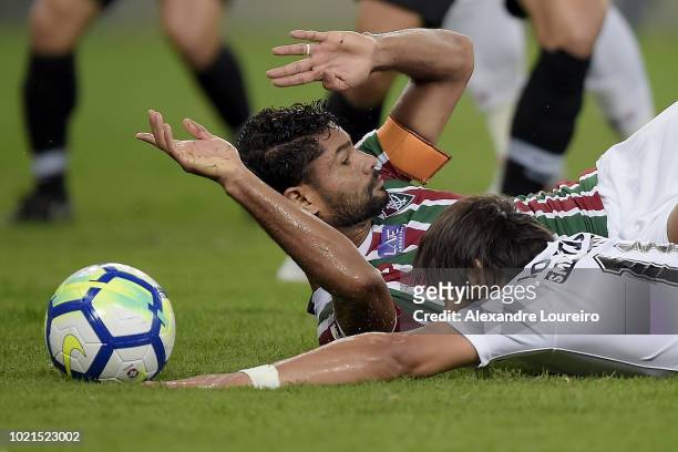 Gum of Fluminense struggles for the ball with Angel Romero of Corinthians during the match between Fluminense and Corinthians as part of Brasileirao...