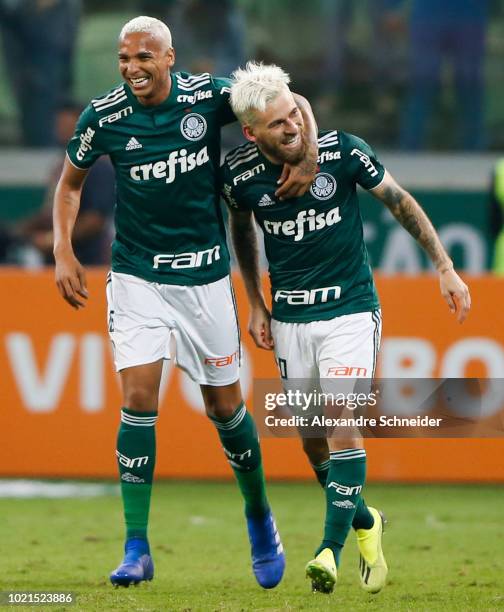 Lucas Lima of Palmeiras celebrates with teammate Deyverson after scoring the second goal of his team during the match against Botafogo for the...