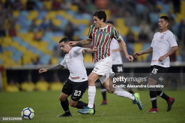 Pedro of Fluminense struggles for the ball with Fagner of Corinthians during the match between Fluminense and Corinthians as part of Brasileirao...