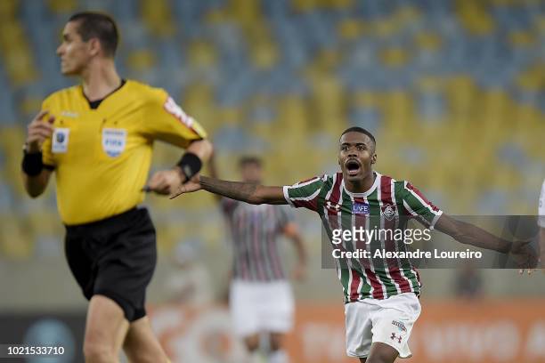Matheus Alessandro of Fluminense of Fluminense telks with the referee Ricardo Marques Ribeiro during the match between Fluminense and Corinthians as...