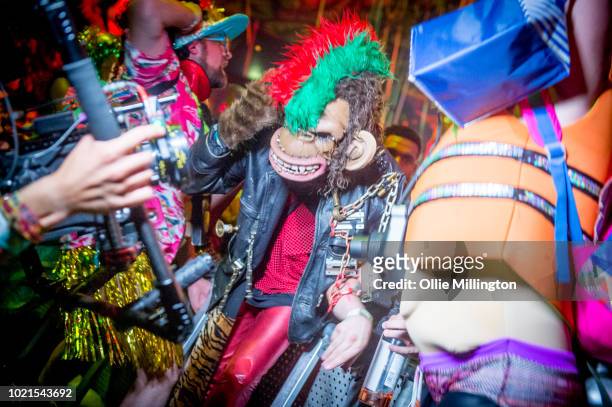 Dancers perform during the Sambodromo do Brasil jungle party in the Cave stage, Elrow Town at Queen Elizabeth Olympic Park on August 18, 2018 in...