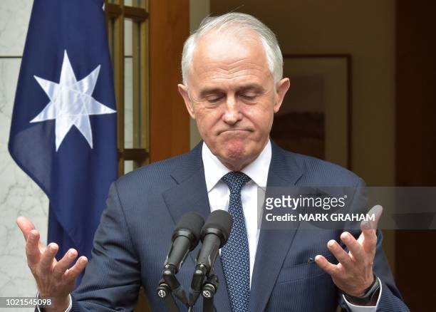 Australia's Prime Minister Malcolm Turnbull gestures during a press conference at Parliament House in Canberra on August 23, 2018. - Australian Prime...