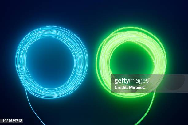 neon colored led cable - haz de luz fotografías e imágenes de stock