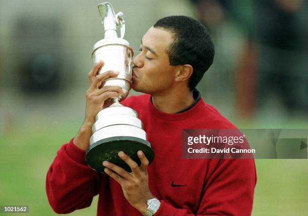 Tiger Woods of the USA with the trophy after winning the British Open Golf Championships at the Old Course, St Andrews, Scotland. Mandatory Credit:...