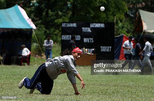 Nepal-conflict-disabled-cricket-women,FEATURE by Subel Bhandari A visually impaired Nepalese woman fields the ball as she participates in a match at...