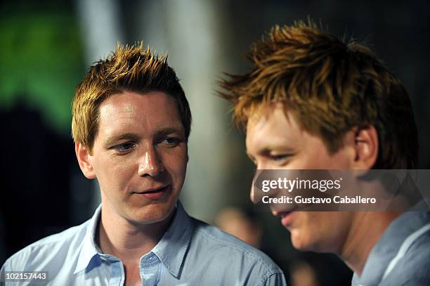 Actors James and Oliver Phelps attends the Grand Opening of The Wizarding World of Harry Potter at Universal Orlando on June 16, 2010 in Orlando,...