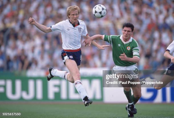 Mark Wright of England and Frank Stapleton of the Republic of Ireland battle for the ball during the UEFA Euro 88 Group 2 match at the Neckarstadion...