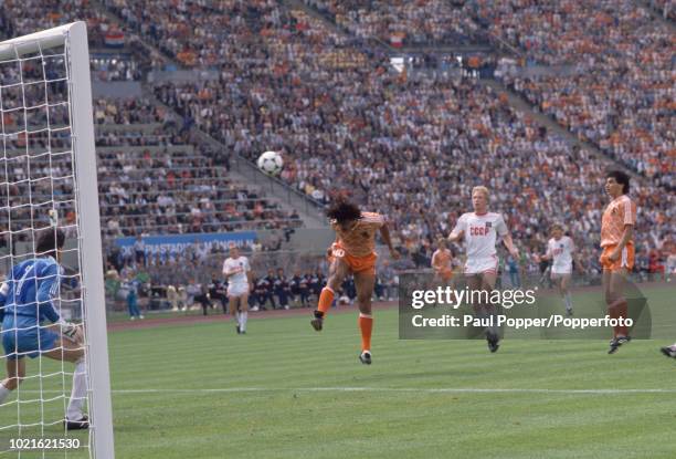 Ruud Gullit of the Netherlands heading the ball past Rinat Dasayev of the Soviet Union to score the first goal during the UEFA Euro 88 Final at the...