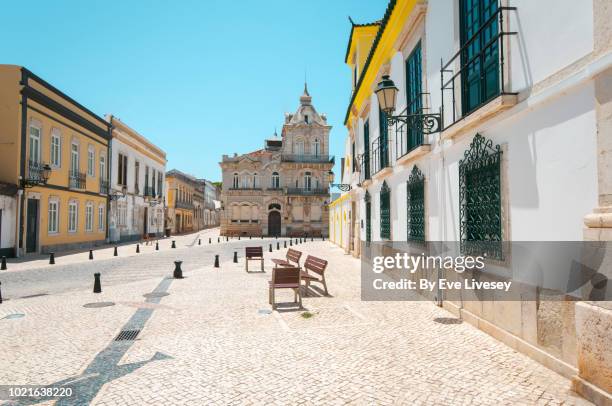pretty street in faro old town - distrito de faro portugal fotografías e imágenes de stock