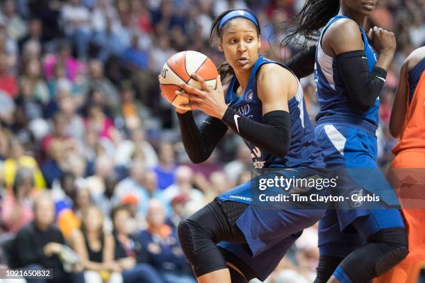 August 17: Maya Moore of the Minnesota Lynx rebounds during the Connecticut Sun Vs Minnesota Lynx, WNBA regular season game at Mohegan Sun Arena on...