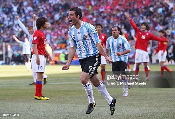 Gonzalo Higuain of Argentina celebrates scoring his side's second goal during the 2010 FIFA World Cup South Africa Group B match between Argentina...