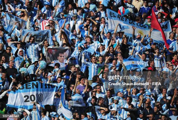 Argentina fans celebrate during the 2010 FIFA World Cup South Africa Group B match between Argentina and South Korea at Soccer City Stadium on June...