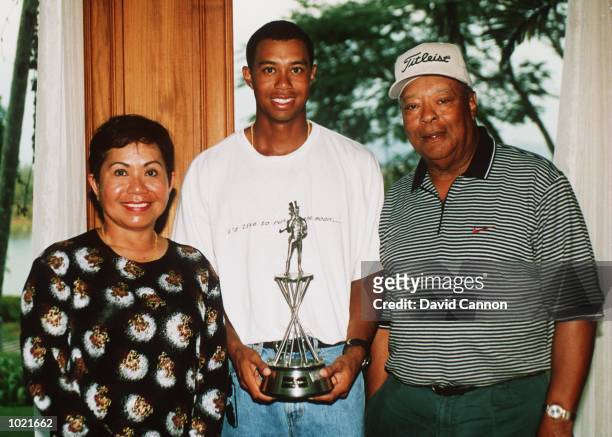 Tiger Woods with his parents Kultida and Earl Woods at the Johnnie Walker Classic at Blue Canyon Golf Club, Thailand. Mandatory Credit: David...