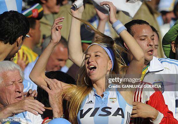 Argentine supporters cheer after Argentina won 4-1 during Group B first round 2010 World Cup football match Argentina vs South Korea on June 17, 2010...