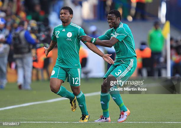 Kalu Uche of Nigeria celebrates after he scores the opening goal with team mate Taye Taiwo during the 2010 FIFA World Cup South Africa Group B match...
