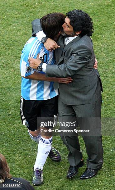 Diego Maradona head coach of Argentina celebrates victory with Lionel Messi of Argentina after the 2010 FIFA World Cup South Africa Group B match...