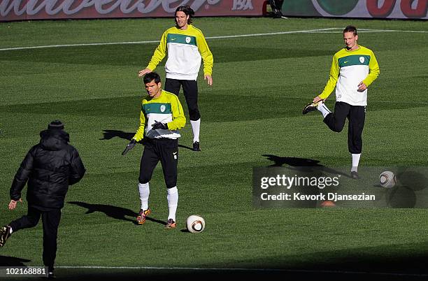 Aleksander Radosavljevic and Tim Matavz of Slovenia warm up during training session at Ellis Park on June 17, 2010 in Johannesburg, South Africa....