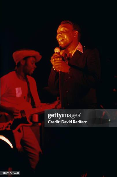 Jamaican singer-songwriter Desmond Dekker performing on stage, circa 1975.