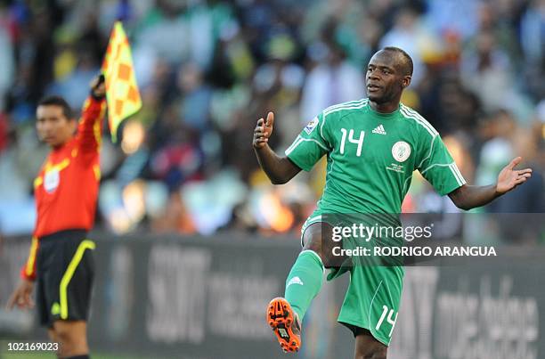Nigeria's midfielder Sani Kaita gestures after he kicked Greece's defender Vasilis Torosidis during the Group B first round 2010 World Cup football...