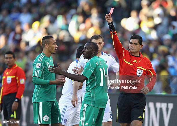 Sani Kaita of Nigeria is shown a red card by referee Oscar Ruiz during the 2010 FIFA World Cup South Africa Group B match between Greece and Nigeria...