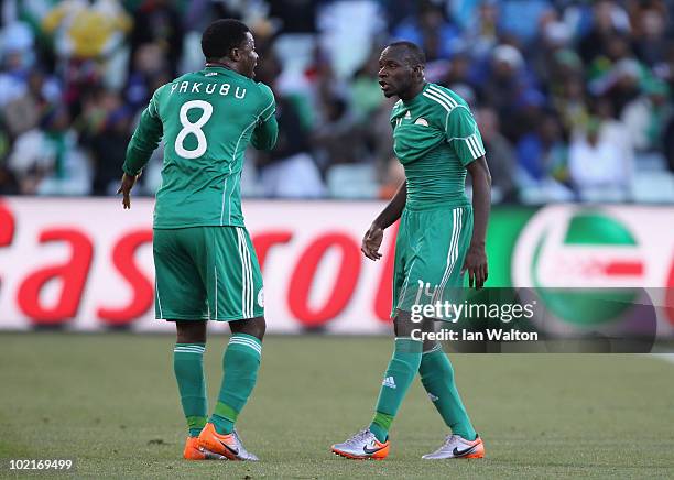 Yakubu Ayegbeni of Nigeria argues with team mate Sani Kaita during the 2010 FIFA World Cup South Africa Group B match between Greece and Nigeria at...
