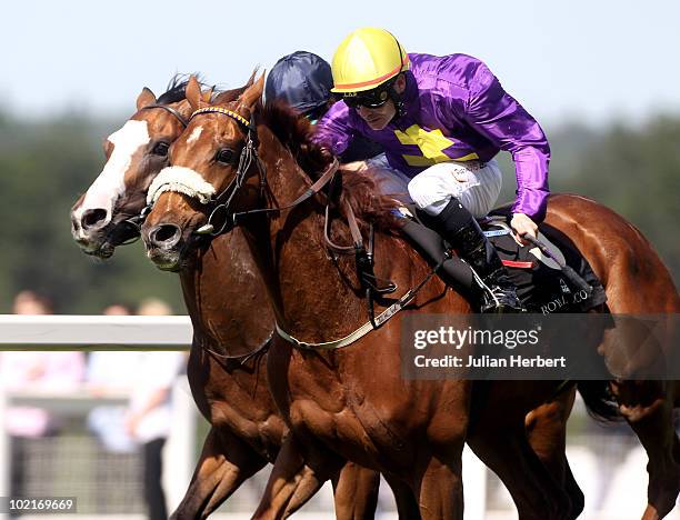 Pat Smullen and Rite Of Passage get the better of the Johnny Murtagh ridden Age Of Aquarius to land The Ascot Gold Cup run on the 3rd Day of Royal...