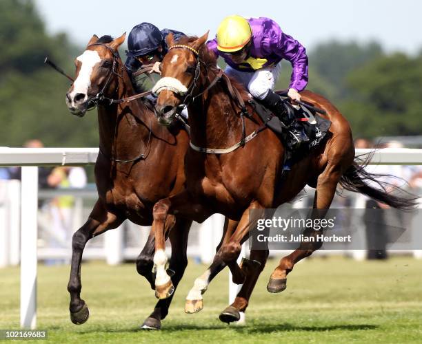 Pat Smullen and Rite Of Passage get the better of the Johnny Murtagh ridden Age Of Aquarius to land The Ascot Gold Cup run on the 3rd Day of Royal...