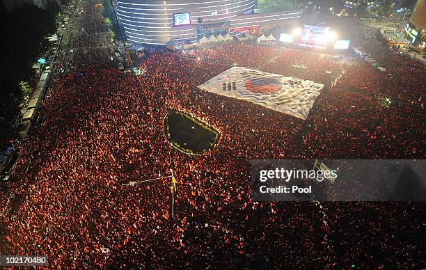 South Korean fans watch the 2010 FIFA World Cup South Africa Group B match between Argentina and South Korea, at City Hall on June 17, 2010 in Seoul,...