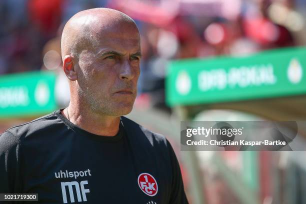 Head coach Michael Frontzeck of Kaiserslautern looks on ahead of the first round DFB Cup match between 1. FC Kaiserslautern and TSG 1899 Hoffenheim...