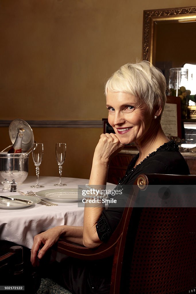 Portrait of senior woman in restaurant