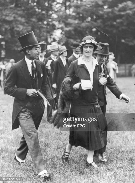 Prince Chichibu of Japan with Nancy Astor and one of her sons on Oaks day at Epsom Racecourse, circa 1925. Astor was the first woman to sit as a...