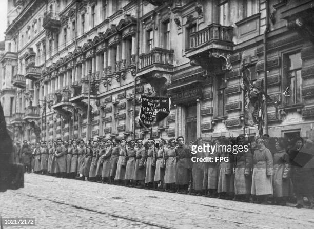 Russian military guard of honour at the funeral of American communist journalist John Reed , who died of spotted typhus while in Moscow, October...