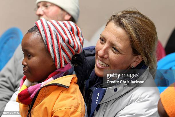 Kedge Martin of Sentebale looks on during a visit to St Leonard's Herd Boy School on June 16, 2010 in Semonkong, Lesotho. The two Princes are on a...