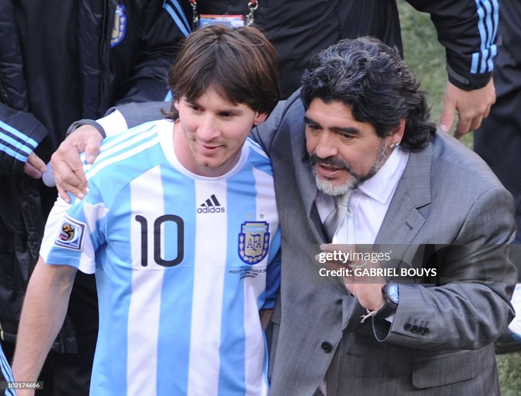 Argentina's coach Diego Maradona (R) and