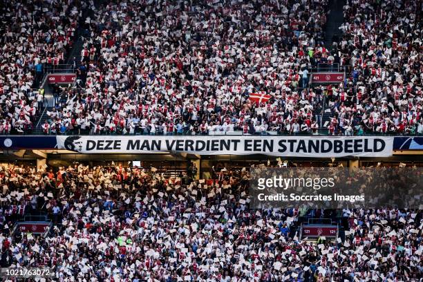 Supporters of Ajax shows a banner Deze man verdient een standbeeld during the UEFA Champions League match between Ajax v Dinamo Kiev at the Johan...