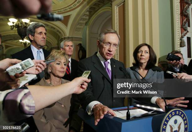 Senate Majority Leader Harry Reid ,speaks while flanked by U.S. Sen. Jeff Bingaman , U.S. Sen. Barbara Boxer , , U.S. Sen. John Kerry and U.S. Sen....