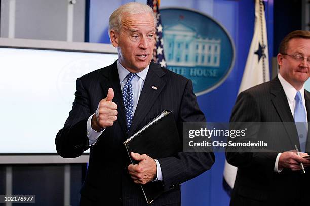 Vice President Joe Biden gives a thumbs-up when asked about the health of his son, Delaware Attorney General Beau Biden, at the conclusion of a press...