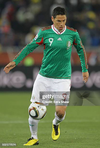 Guillermo Franco of Mexico controls the ball during the 2010 FIFA World Cup South Africa Group A match between France and Mexico at the Peter Mokaba...