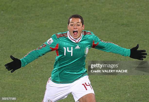 Mexico's striker Javier Hernandez celebrates after scoring against France during the 2010 World Cup group A first round football match between Mexico...
