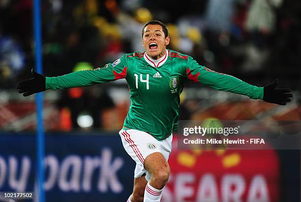 Javier Hernandez of Mexico celebrates scoring the opening goal during the 2010 FIFA World Cup South Africa Group A match between France and Mexico at...