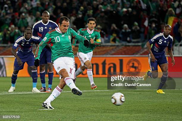 Cuauhtemoc Blanco of Mexico converts a penalty for his team's second goal during the 2010 FIFA World Cup South Africa Group A match between France...