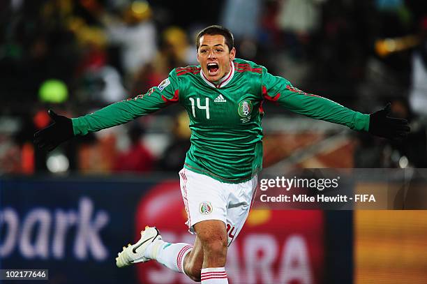 Javier Hernandez of Mexico celebrates scoring the opening goal during the 2010 FIFA World Cup South Africa Group A match between France and Mexico at...