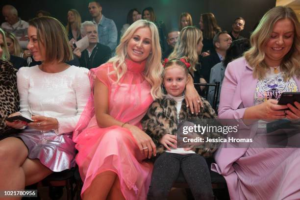 Roxy Jacenko and her daughter Pixie Curtis sit in the front row during the Myer Spring Summer 18 Collections Launch on August 23, 2018 in Sydney,...