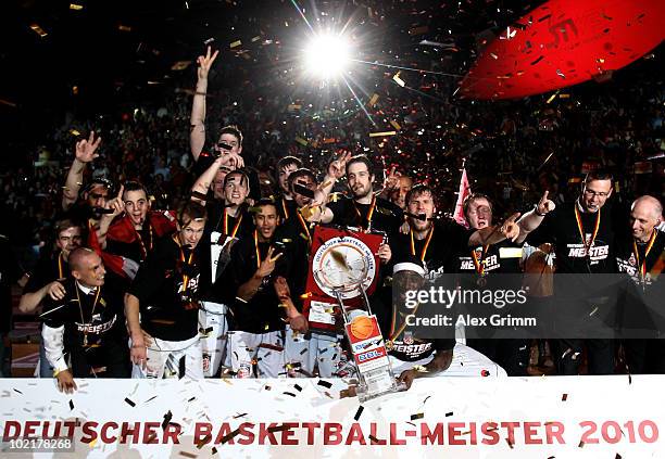 Players of Brose Baskets celebrate the German Championship after winning game five of the Beko Basketball Bundesliga play off finals against Deutsche...