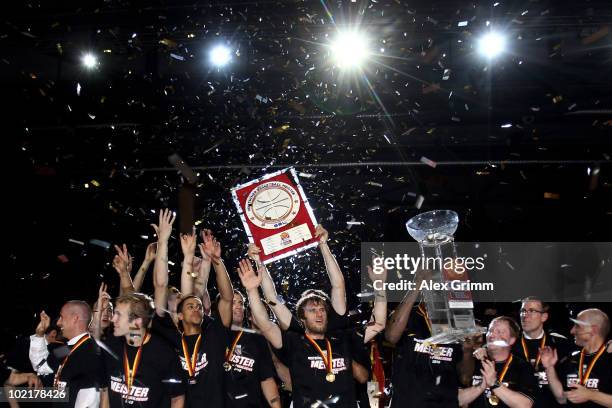 Players of Brose Baskets celebrate the German Championship after winning game five of the Beko Basketball Bundesliga play off finals against Deutsche...